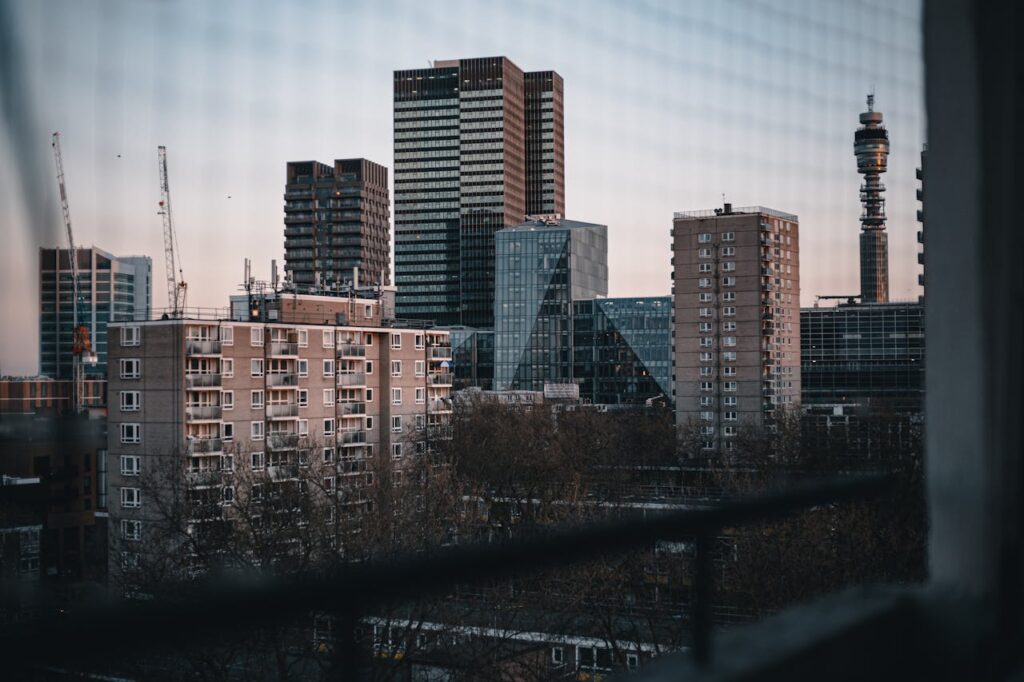 A stunning view of London's skyline with modern skyscrapers during sunset.